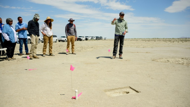 Daron Duke of the Far Western Anthropological Research Group speaks with visitors about Ice-Age footprints discovered on the Utah Test and Training Range, a US military facility in Utah's western desert