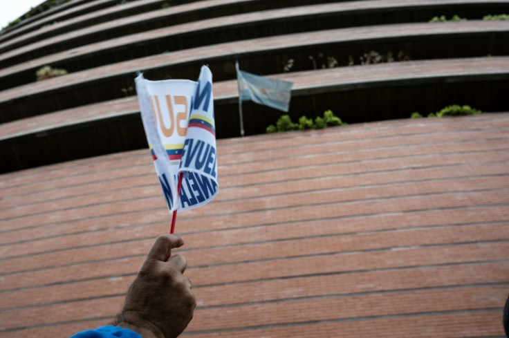 Workers of state airline Conviasa protested outside the Argentine embassy in Caracas