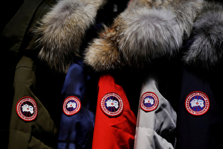 Jackets hang in the showroom of the Canada Goose factory in Toronto