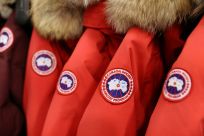 Labels are seen on Canada Goose jackets in a store in Manhattan, New York City