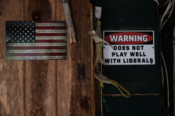 Signs hang inside of the Moose Pond Club near Minerva