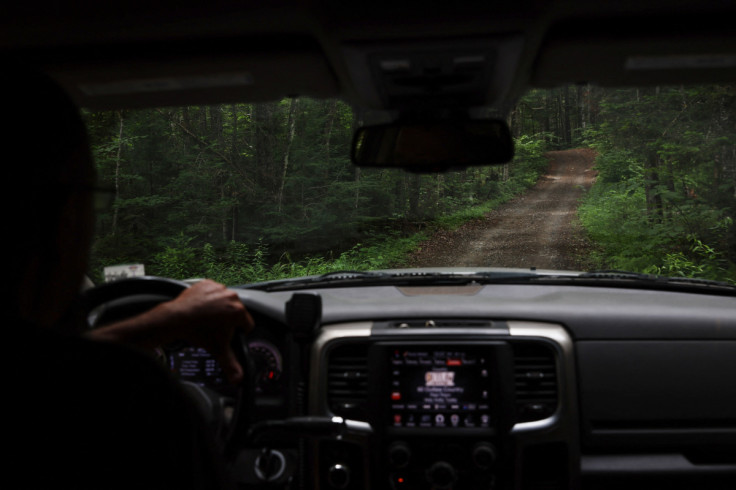 Rick Bennett drives off of New York State Route 28N to the Moose Pond Club near Minerva