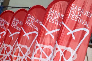 Sarajevo Film Festival logos are seen on the flags at the Open Air Cinema in Sarajevo