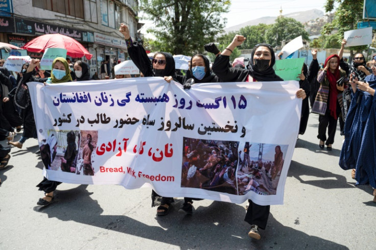 The protesters carried a banner that read 'August 15 is a black day'