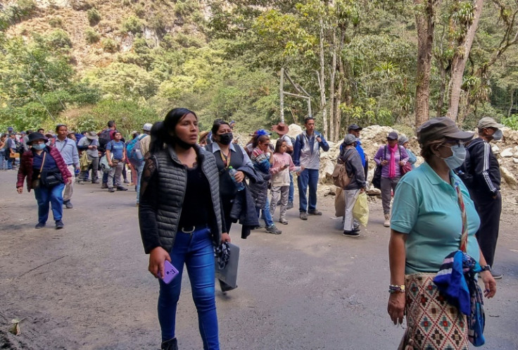 Tourists and tour operators remain stranded in Aguas Calientes, also known as Machu Picchu Pueblo, in the foothills of the famous Inca ruins close to Cusco in the Peruvian Andes, on August 12, 2022.