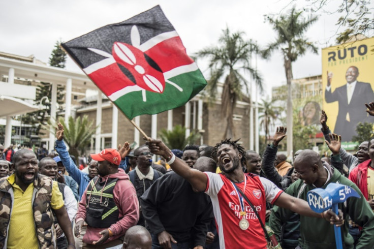 Supporters of Odinga's coalition gathered in downtown Nairobi near a poster of his rival Ruto
