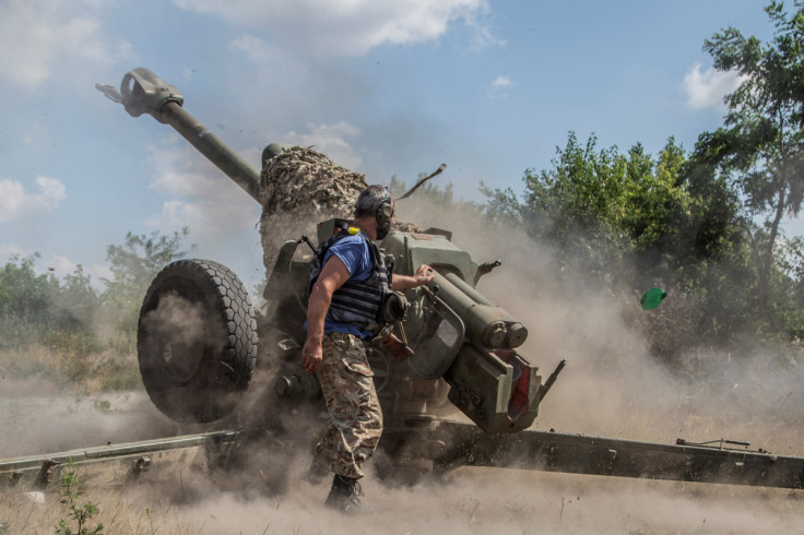 Ukrainian serviceman fires with a D-30 howitzer near a frontline in Mykolaiv region