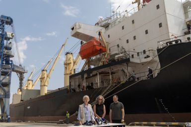 UN official Brown, Deputy Country Director at WFP Ward and Ukraine's Infrastructure minister Kubrakov attend a news briefing in font of the Lebanese-flagged bulk carrier Brave Commander in the sea port of Pivdennyi