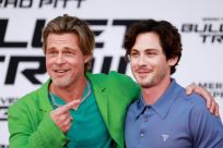US actors Brad Pitt (L) and Logan Lerman attend the Los Angeles premiere of "Bullet Train" in Westwood, California