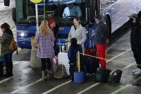 Travellers board buses at Union Station ahead of the Thanksgiving holiday in Washignton