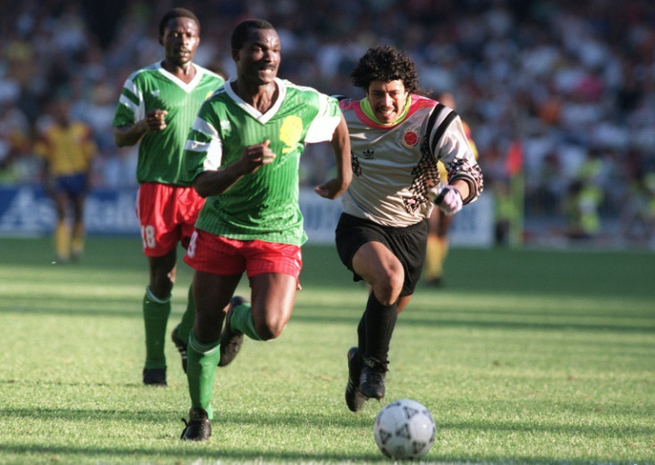 Rene Higuita gives chase in vain after losing the ball to Roger Milla who sprinted away to score the winner for Cameroon in Naples in the 1990 World Cup