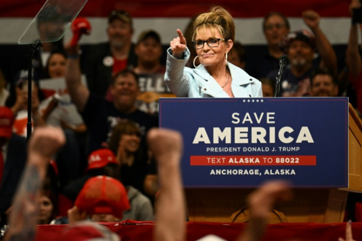 US House candidate Sarah Palin, pictured at a July 2022 rally in Anchorage, is seen as a polarizing figure in Alaska