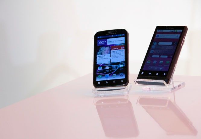 The Motorola PHOTON 4G Summer L and the Motorola TRIUMPH Virgin Mobile Summer mobile phones are seen during their launch in New York June 9, 2011