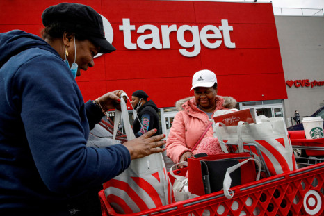 Shoppers exit a Target store during Black Friday sales in Brooklyn, New York