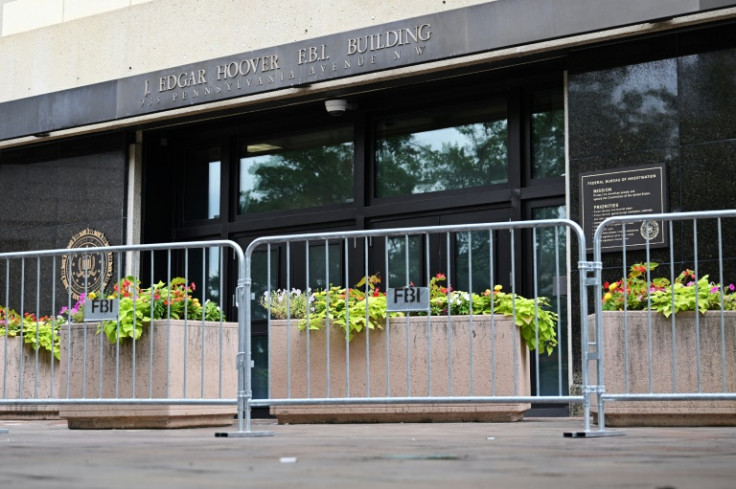 Security fencing outside the FBI headquarters in Washington, DC after threats rose following the raid on Donald Trump's home.
