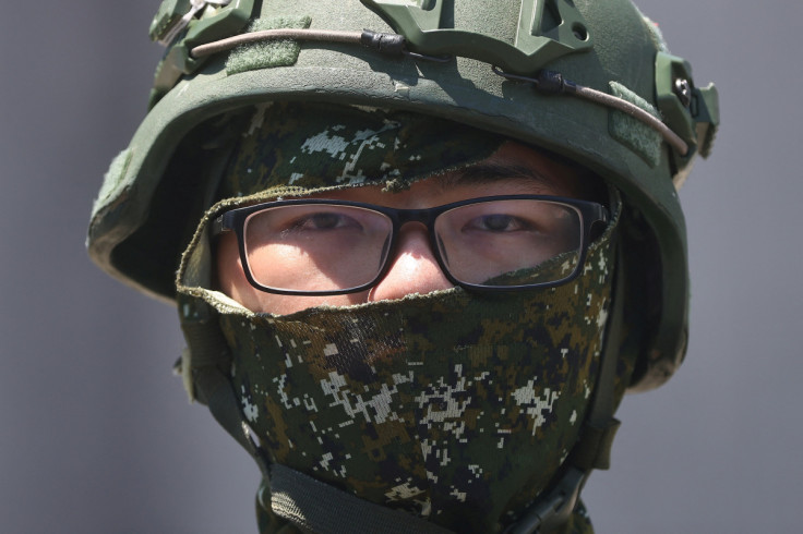 A soldier stands guard at an airbase in Hualien