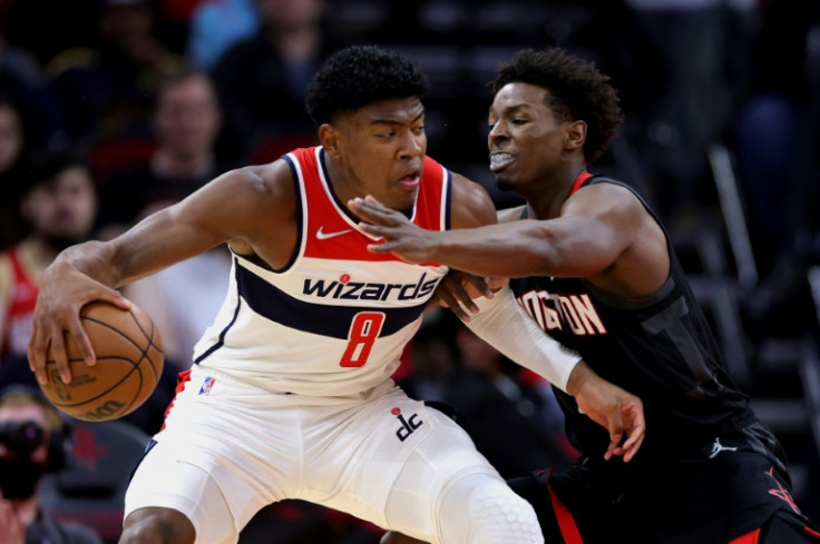 Japanese forward Rui Hachimura of the Washington Wizards, at left guarded by Houston's Jae'Sean Tate, will have the chance to play in front of fans in his homeland when the NBA Global Games resume next month