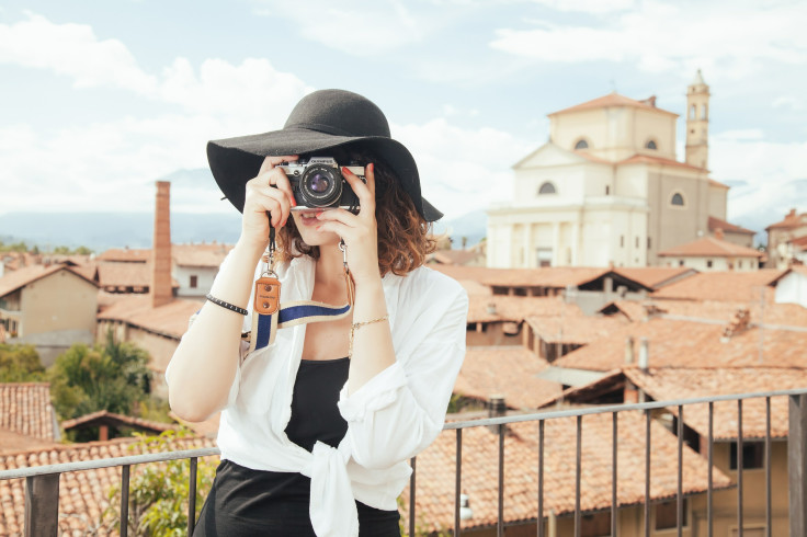 Woman Takes A picture: World PhotographyDay