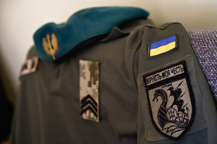 Ukrainian soldier Dovzhenko’s military uniform is pictured during an interview for Reuters at his home in Wroclaw