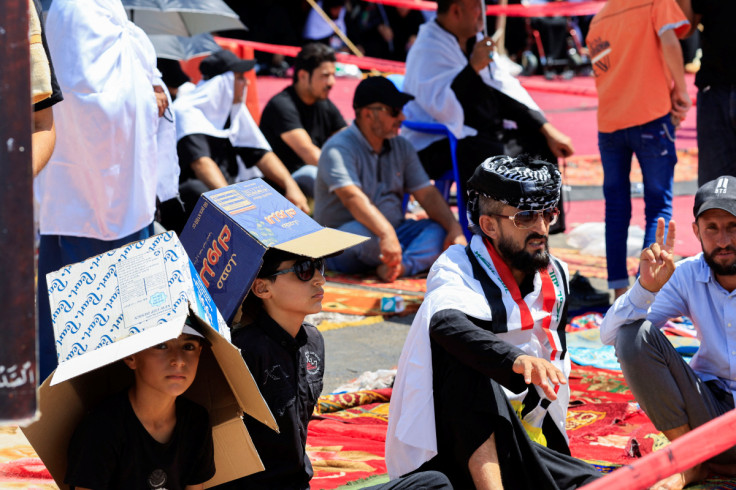 Supporters of Iraqi populist leader Moqtada al-Sadr gather for mass Friday prayer, in Baghdad