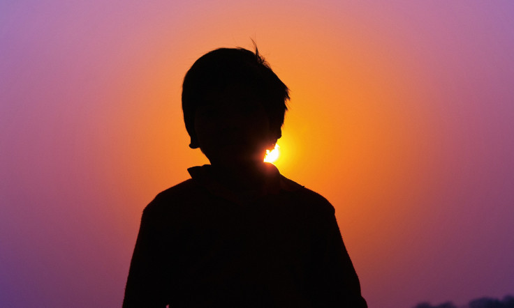 Silhouette of a boy.