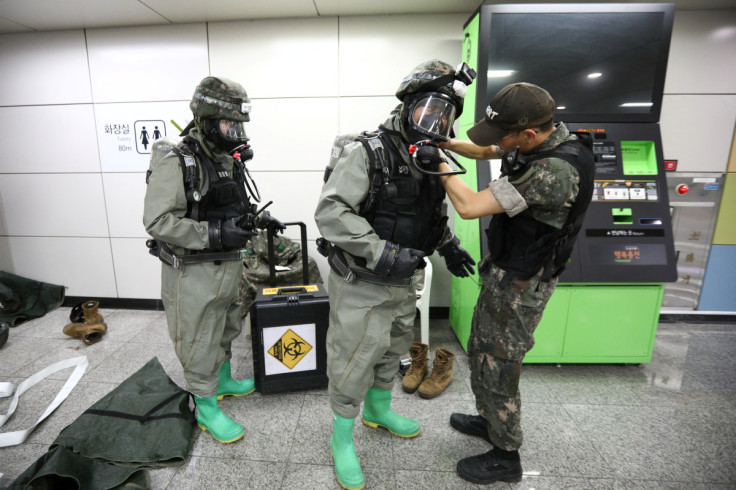 South Korean soldiers take part in an anti-terror drill as part of the Ulchi Freedom Shield (UFS) exercise at a subway station in Incheon