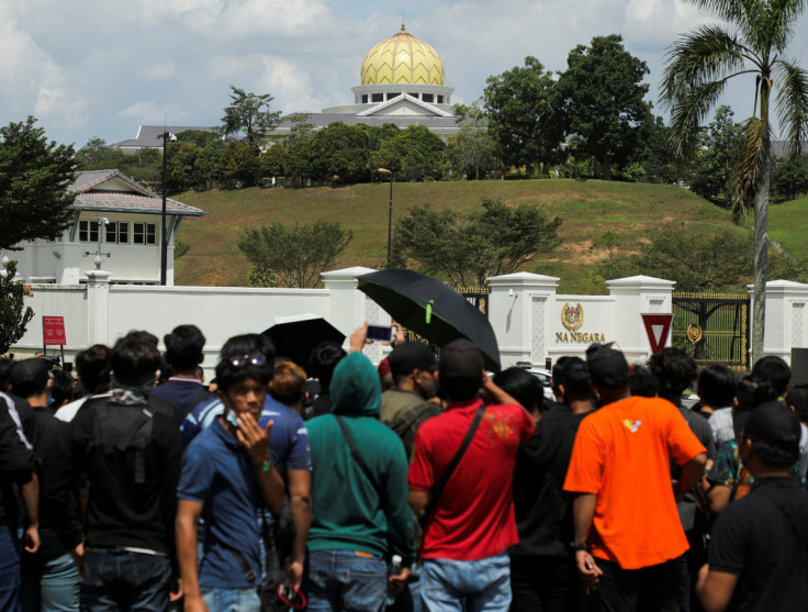 Supporters of former Malaysian Prime Minister Najib Razak gather outside the National Palace to handover a memorandum against Najib's jail sentence in Kuala Lumpur