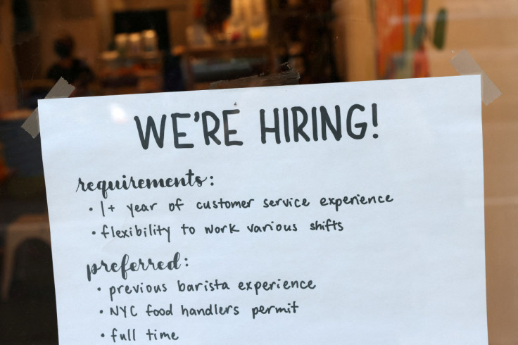 A hiring sign is seen in a cafe in New York City