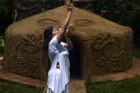Alizbeth Camacho conducts a pre-Hispanic ritual in front of a temazcal, a type of sweat lodge, in Tepoztlan, Mexico