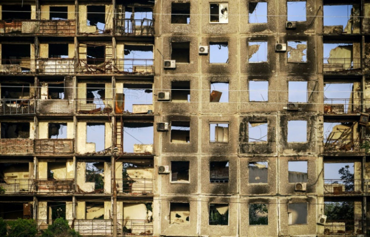 Many civilian buildings, like this one in Mariupol, have been destroyed during the six months of the war.