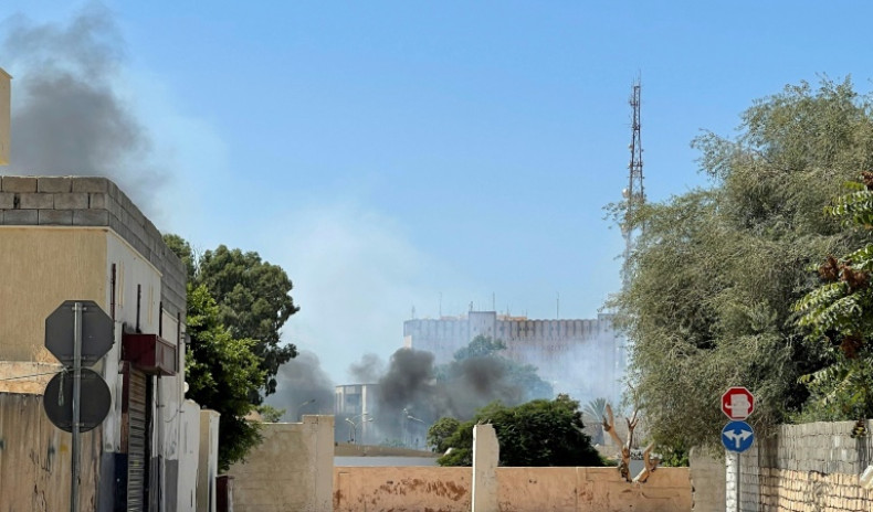 Small arms fire and explosions shook several areas of Tripoli overnight, continuing into Saturday