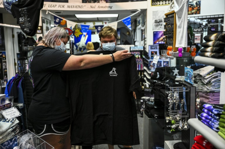Tourists at a space t-shirt store shop near the Kennedy Space Center in Florida, August 27, 2022