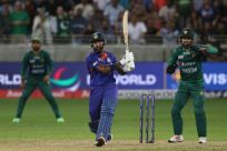 Hardik Pandya smacks a boundary as he propels India to a last-over victory over Pakistan