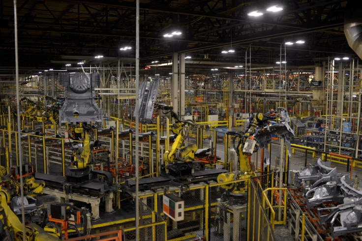 Robotic arms bring together car frames for welding at Nissan Motor Co's automobile manufacturing plant in Smyrna Tennessee