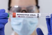Illustration shows test tubes labelled "Monkeypox virus positive