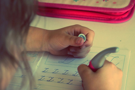 Representative Image. A child writing