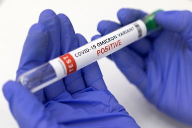 Illustration shows test tube labelled "COVID-19 Omicron variant test positive