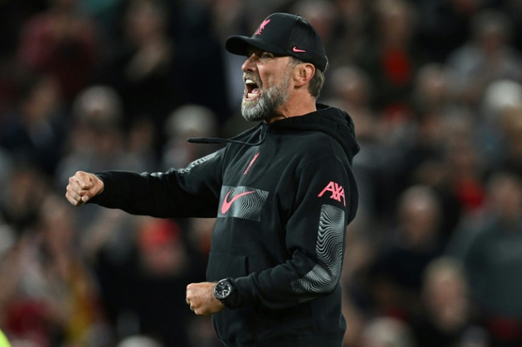 Liverpool manager Jurgen Klopp celebrates on the Anfield pitch