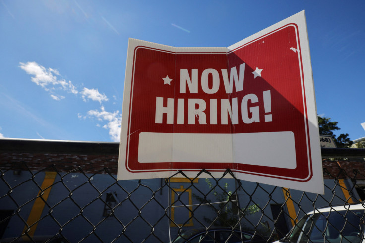 A "now hiring" sign is displayed in Somerville