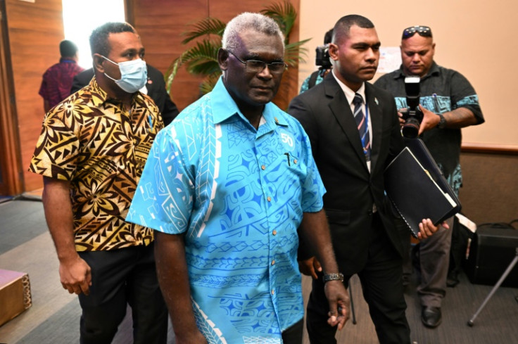 Solomon Island's Prime Minister Manasseh Sogavare (C) expects the snap ban on foreign naval vessels to be lifted soon