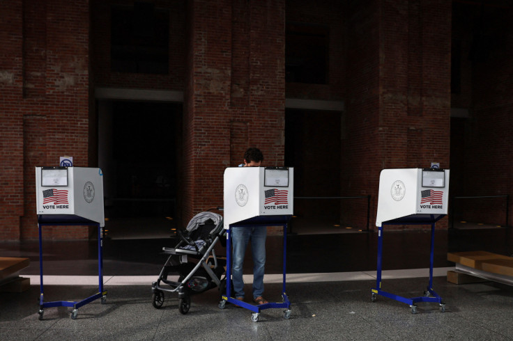 A voter fills out a ballot for New York's primary election at a polling station in Brooklyn, New York