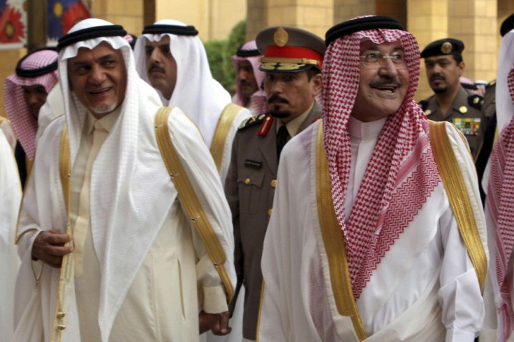 Saudi Prince Sattam Bin Abdul Aziz (R) and Prince Turki Al Faisal leave Imam Turki bin Abdullah mosque in Riyadh
