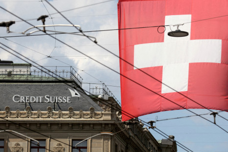 Switzerland's national flag flies in front of the headquarters of Swiss bank Credit Suisse in Zurich