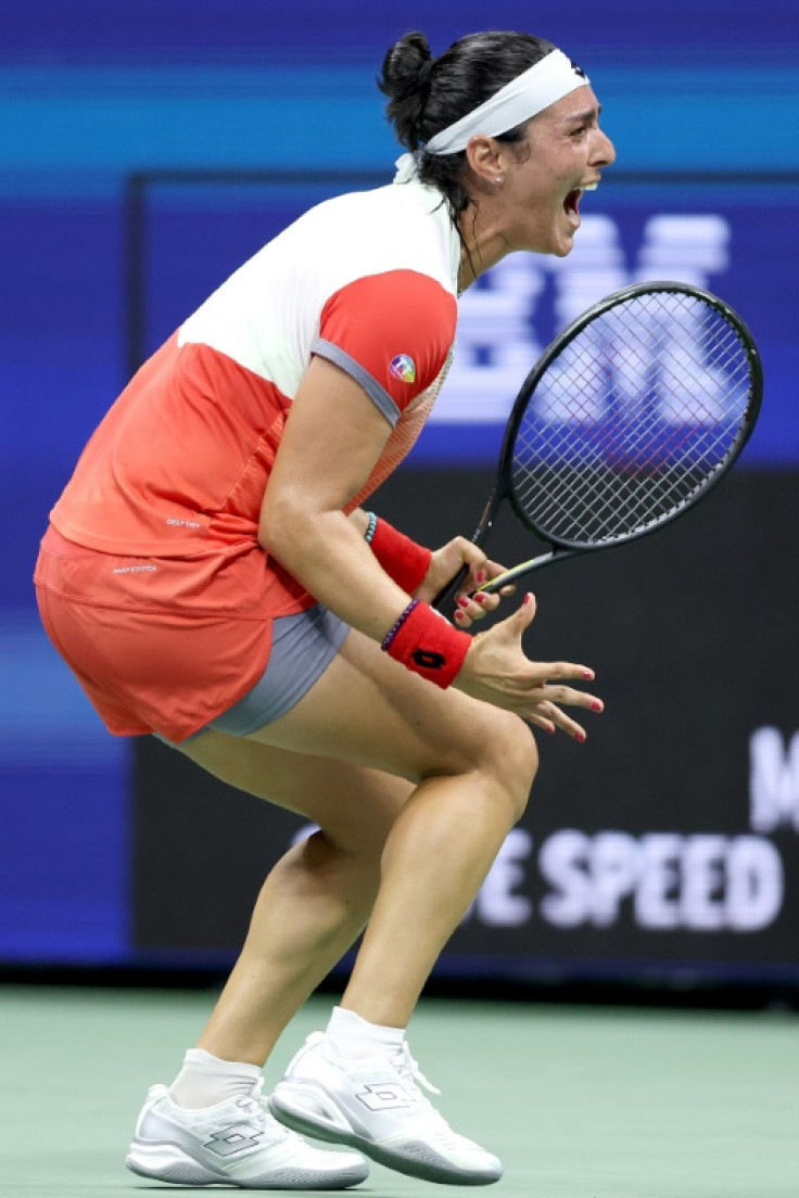 Ons Jabeur dari Tunisia merayakan setelah mengalahkan Caroline Garcia untuk mencapai final AS Terbuka