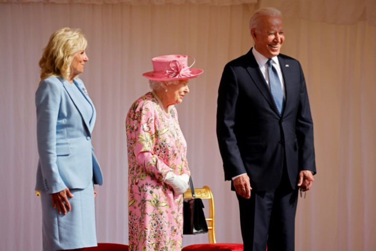 US President Joe Biden (R) said the queen (C) reminded him of his mother