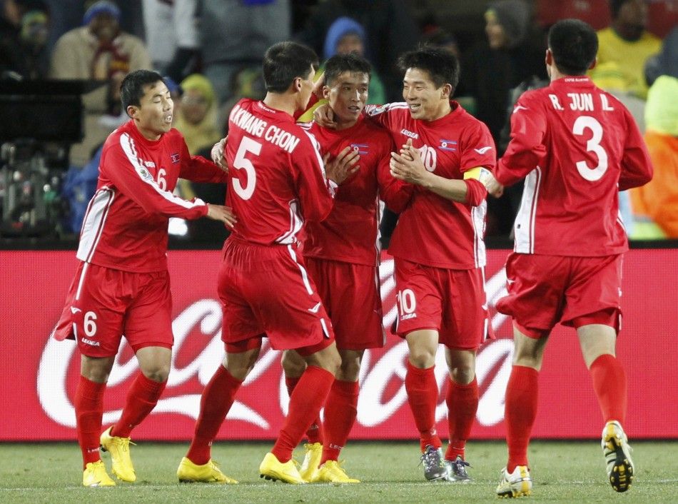 North Koreas Ji Yun-nam C celebrates his goal with team mates during the 2010 World Cup Group G soccer match against Brazil at Ellis Park stadium in Johannesburg June 15, 2010 