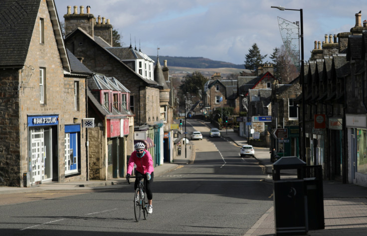 A cyclist is seen riding in Pitlochry