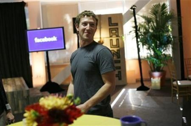 Facebook CEO Mark Zuckerberg walks through Facebook headquarters at a news conference in Palo Alto, California in this August 18, 2010 file photo.