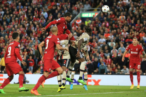 Joel Matip rises to head in Liverpool's late winner against Ajax