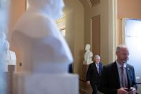Senate Minority Leader McConnell walks to the Senate Floor on Capitol Hill in Washington